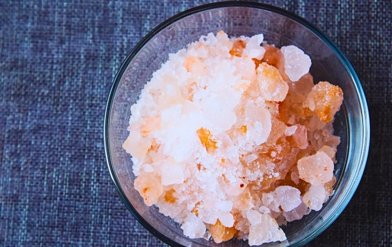 How Will the Rock Salt Shortage Impact Chicago? 1 Top-down view of pink Himalayan salt in a bowl.