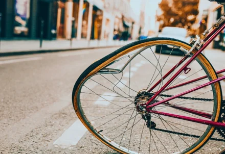 A bicycle with a severely bent and damaged wheel. Bicycle Accidents Are Increasing in Chicago