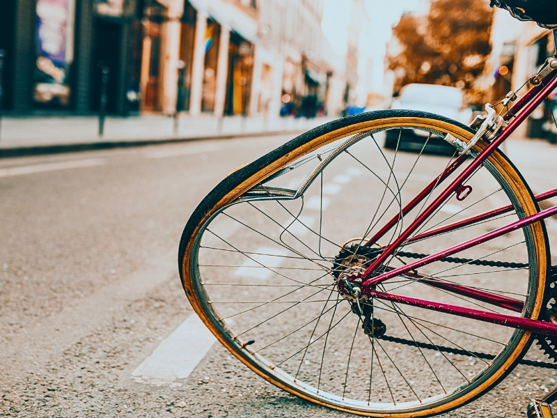 A bicycle with a severely bent and damaged wheel. Bicycle Accidents Are Increasing in Chicago